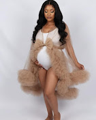 Maternity portrait in a champagne tulle robe